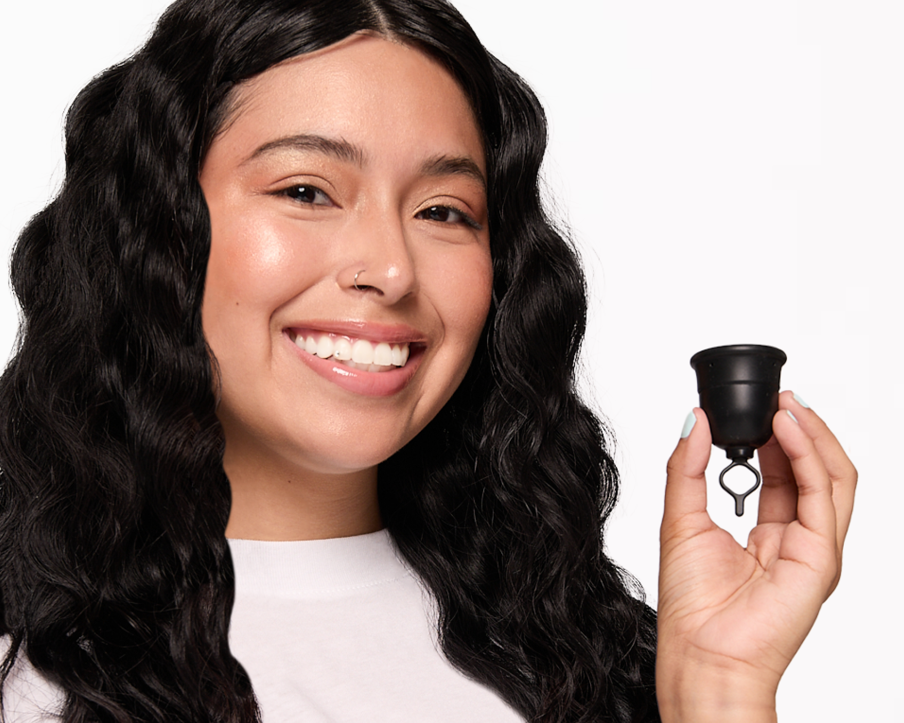 menstrual-cup-with-ring-stem-held-in-hand.png