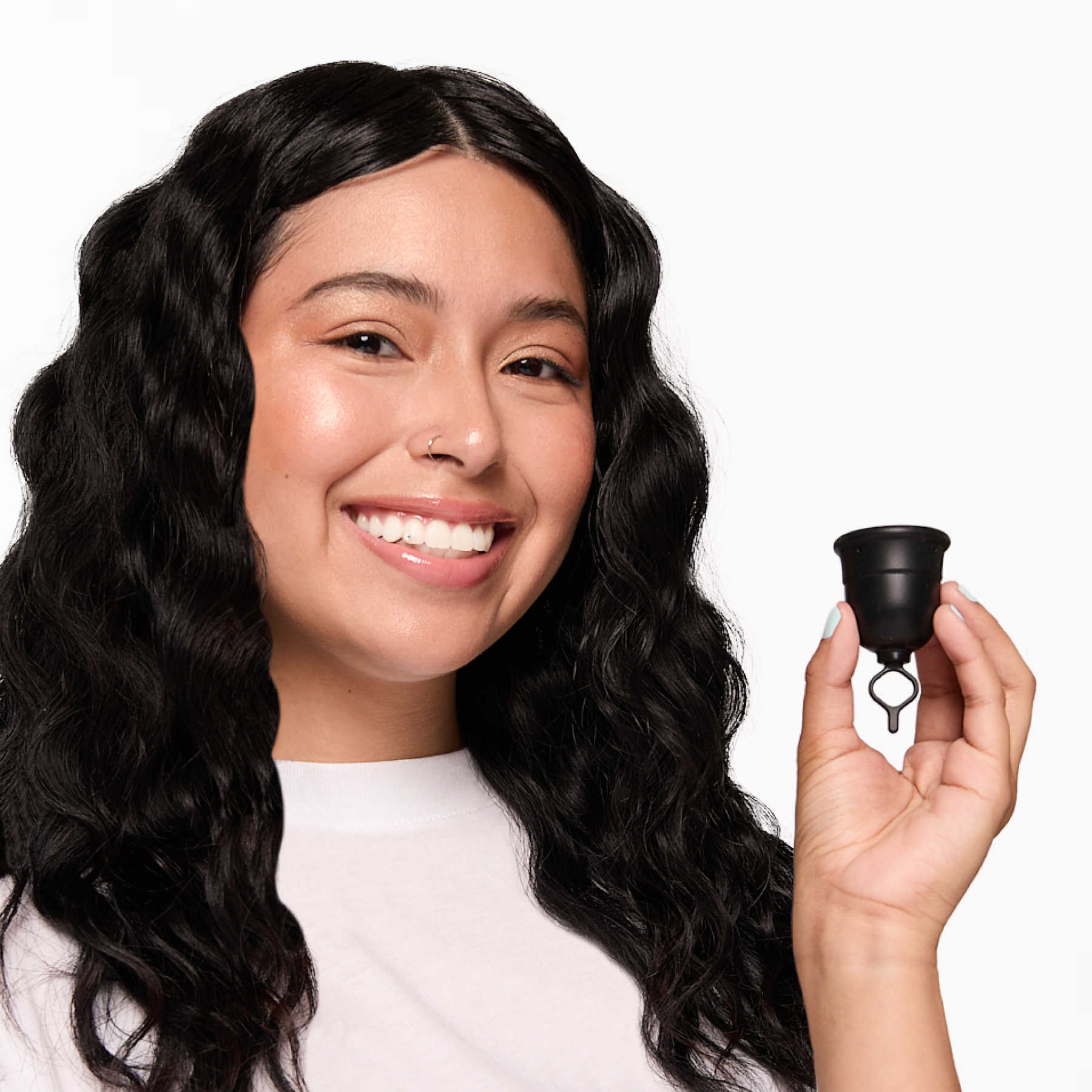 menstrual-cup-with-ring-stem-held-in-hand.png