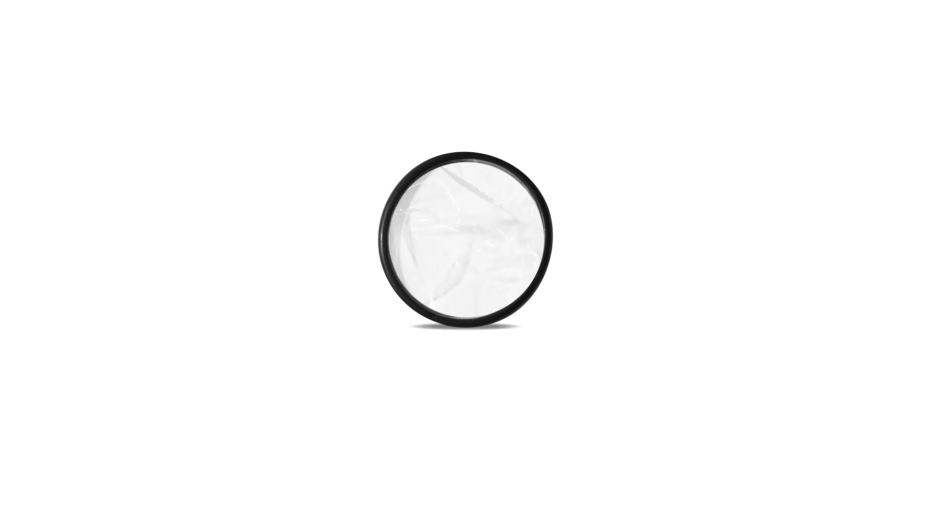 Menstrual disc with flexible rim shown flat on white background