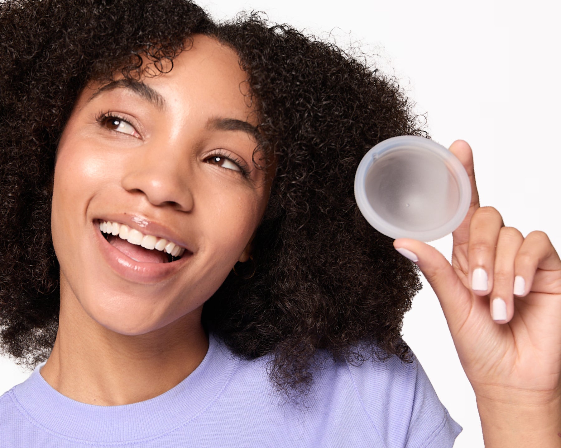 reusable-menstrual-disc-held-in-hand.jpg